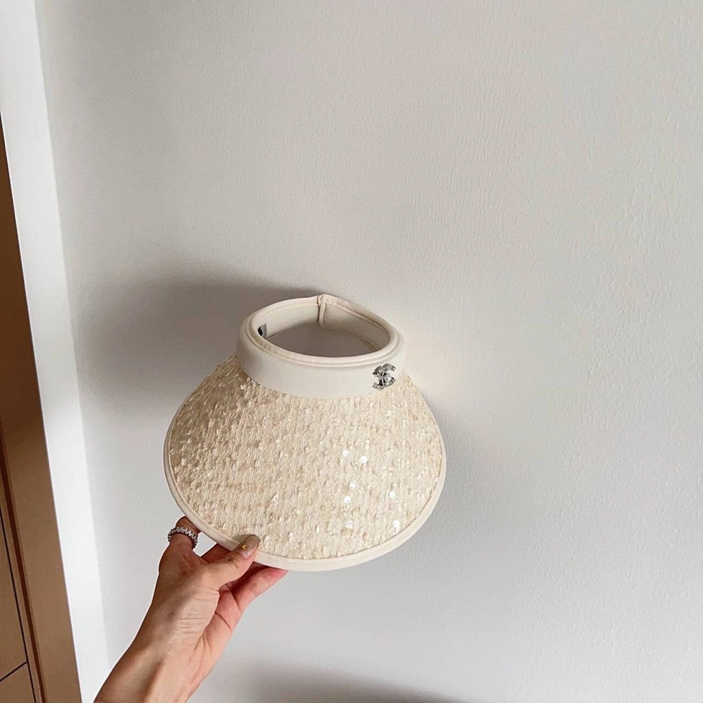 Charming headpiece from Chanel in a golden hue