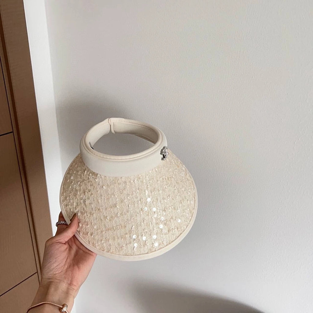 Charming headpiece from Chanel in a golden hue